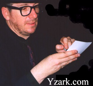 Elvis Costello
Signs and Autograph